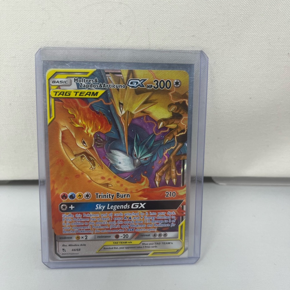 The Legendary Trio GX Tag Team card featuring Moltres Zapdos Articuno GX 44/68